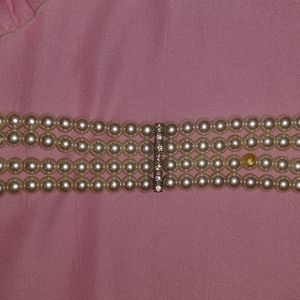 Beaded necklace with strips of crystal